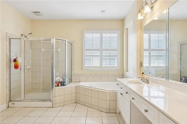 a kitchen with sink and refrigerator