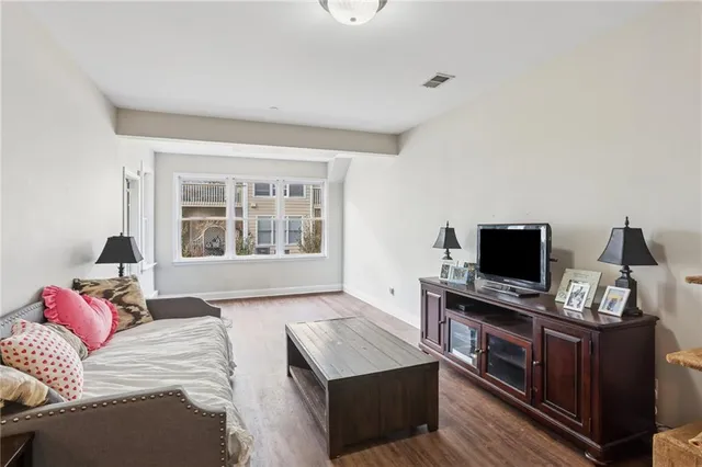 a view of a building with a yard