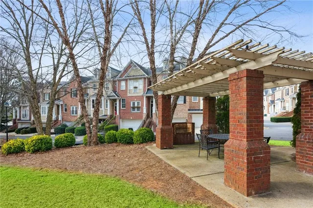 a view of a balcony with a tree