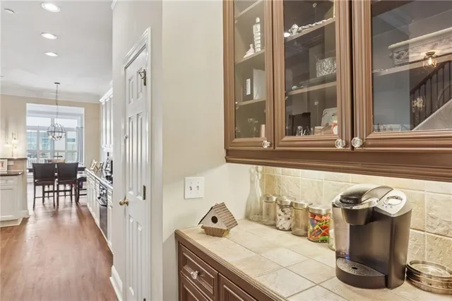 a kitchen with a sink and a stove top oven