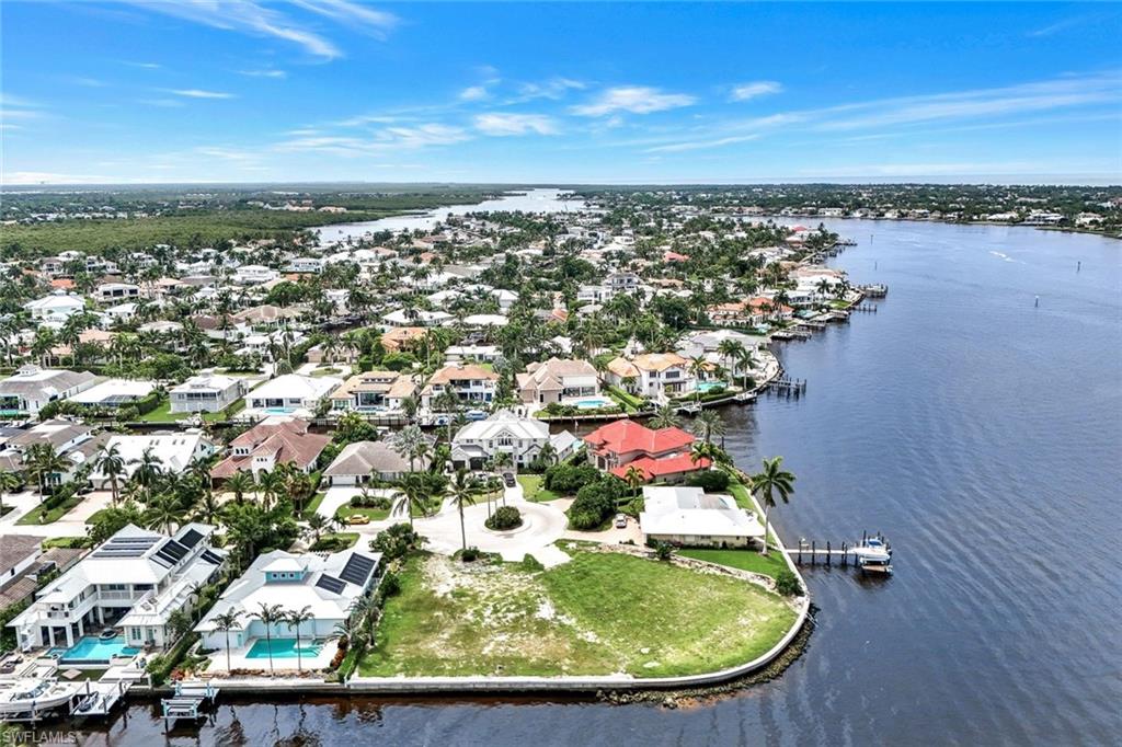 1303 Marlin Drive Naples, FL 34102 - Photo 13 of 15 Birds eye view of property featuring a water view