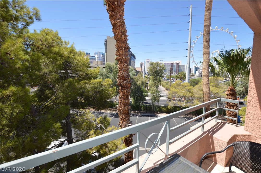 220 East Flamingo Road, Unit 327 Las Vegas, NV 89169 - Photo 2 of 13 Enjoy city vistas and vibrant green surroundings from this private balcony.