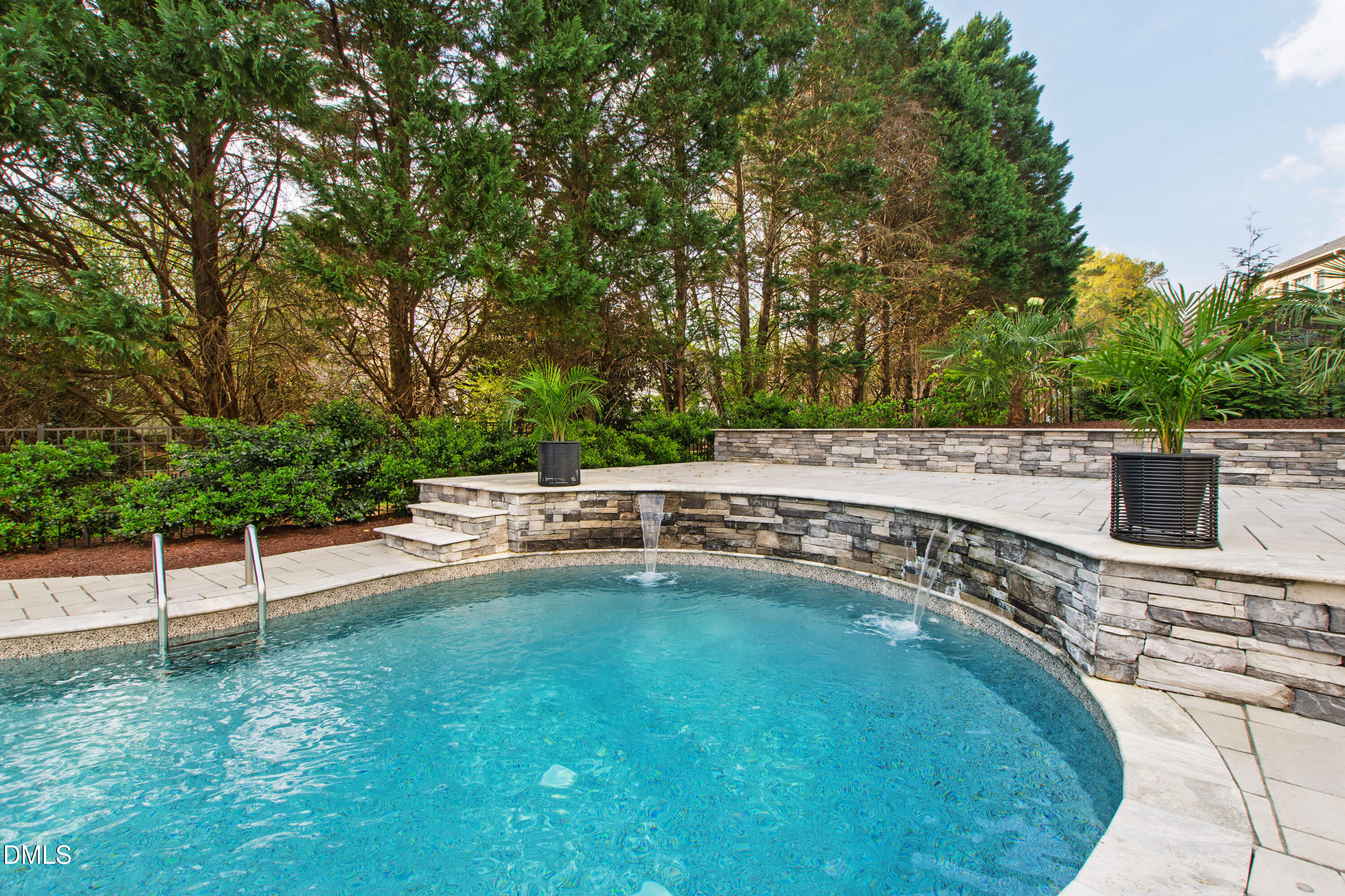 12408 Cilcain Court Raleigh, NC 27614 - Photo 3 of 80 a view of a swimming pool with a patio and a yard