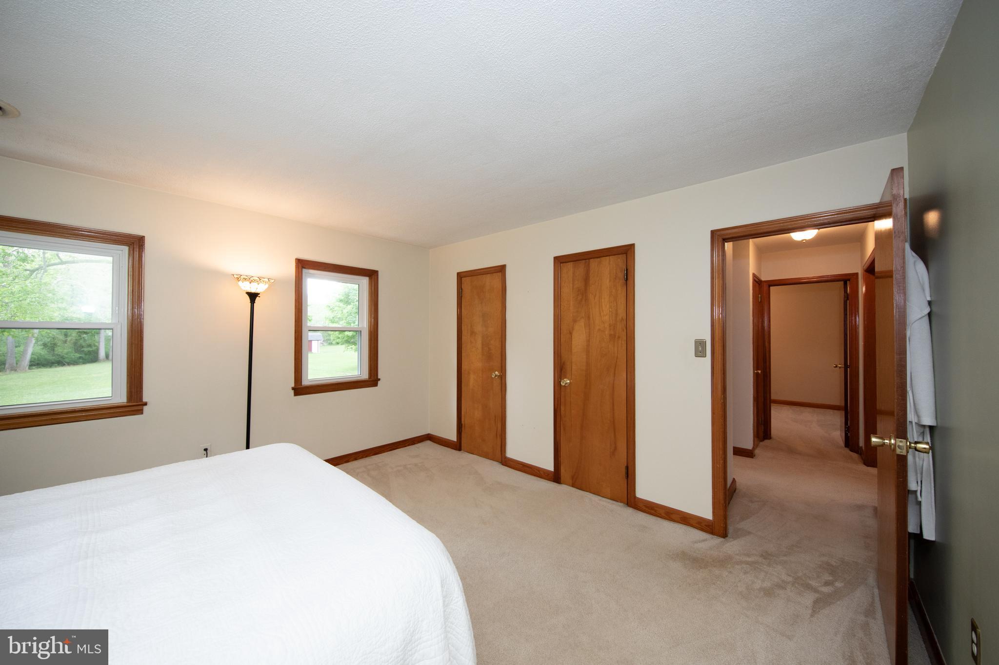 407 Wilgis Road Fallston, MD 21047 - Photo 22 of 37 a bedroom with a bed and a window