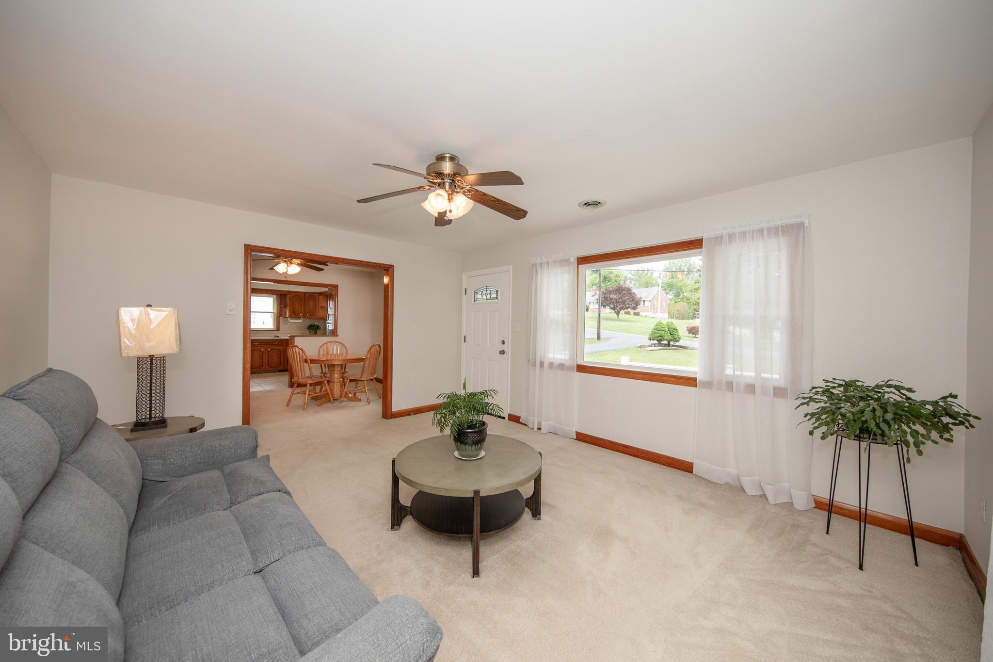 407 Wilgis Road Fallston, MD 21047 - Photo 9 of 37 a living room with furniture and a potted plant