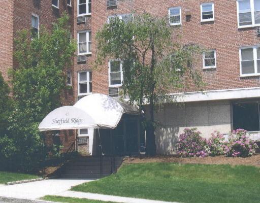 45 Maple Street, Unit 3G Norwalk, CT 06850 - Photo 1 of 1 a front view of a house with garden
