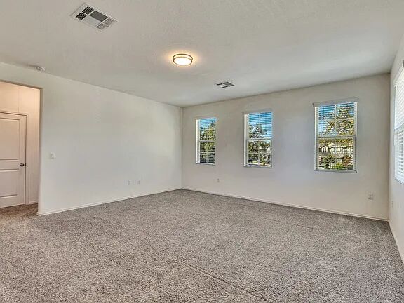 10403 Bramble Berry Drive Austin, TX 78748 - Photo 8 of 21 an empty room with windows