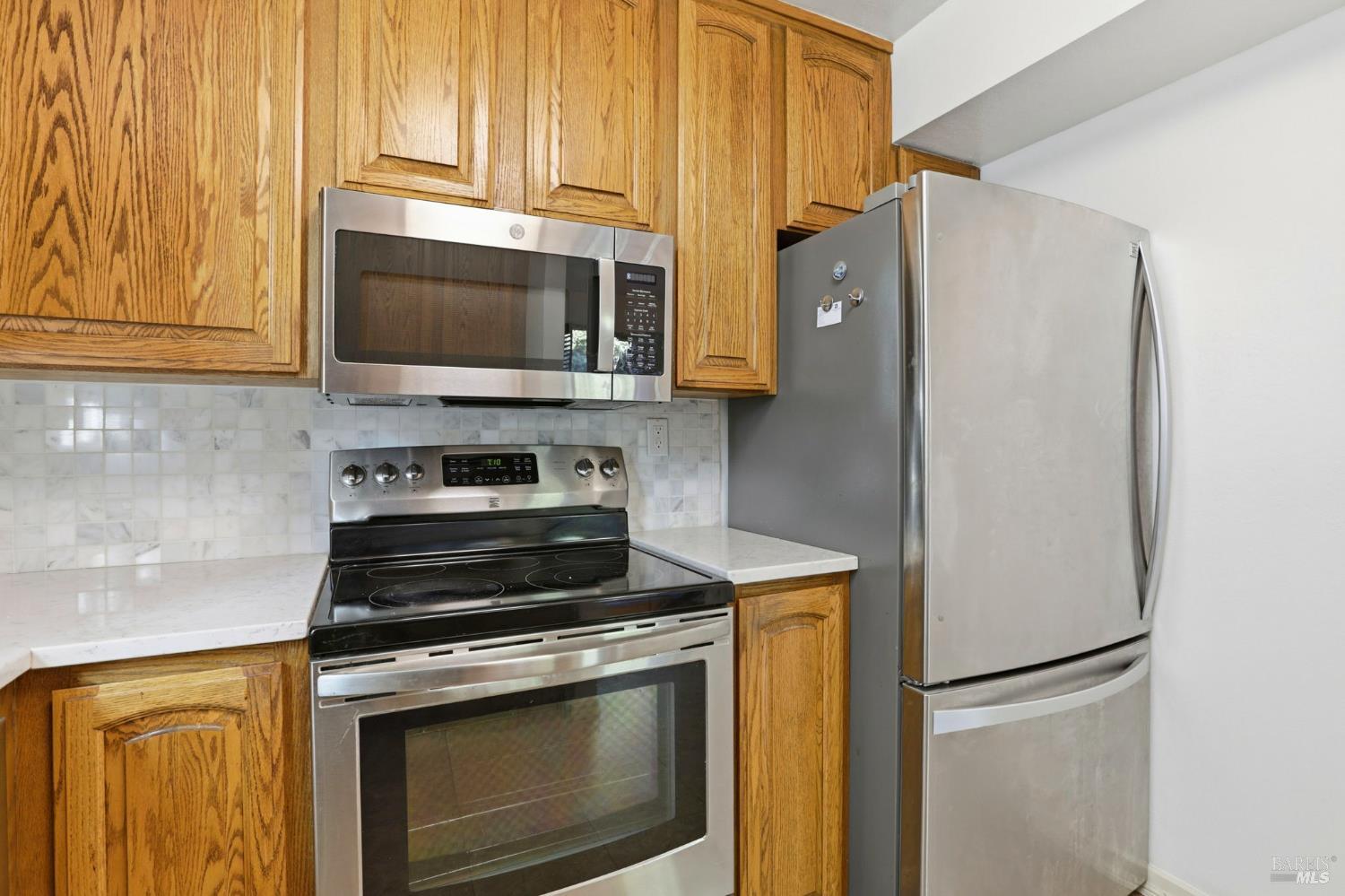 380 Sunset Way Mill Valley, CA 94941 - Photo 13 of 41 a kitchen with a stove microwave and refrigerator