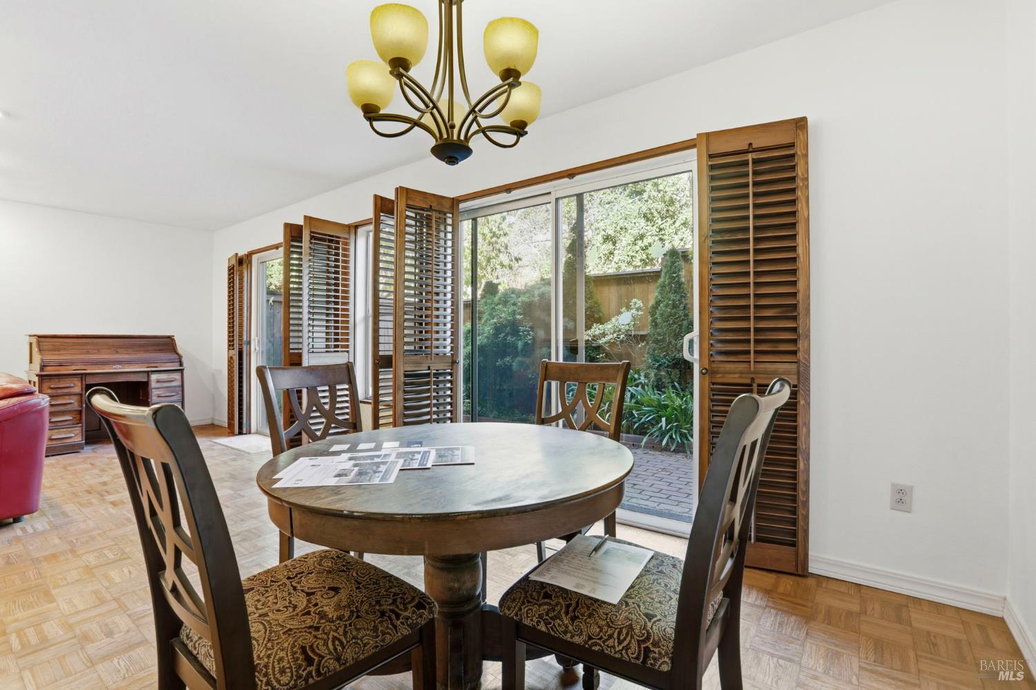 380 Sunset Way Mill Valley, CA 94941 - Photo 16 of 41 a view of a dining room with furniture window and wooden floor