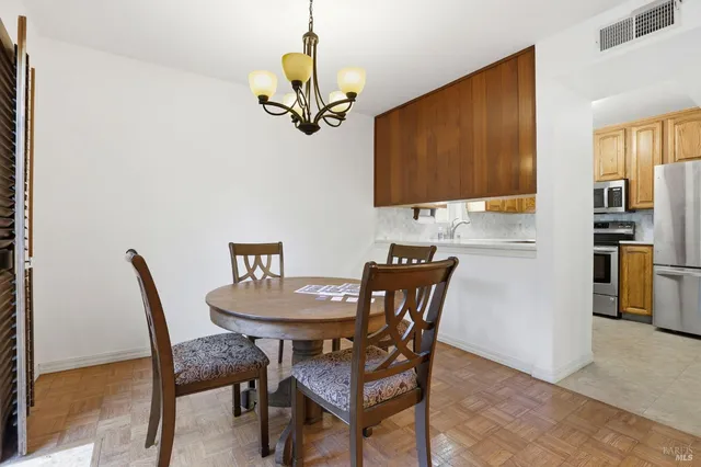 a view of a dining room with furniture