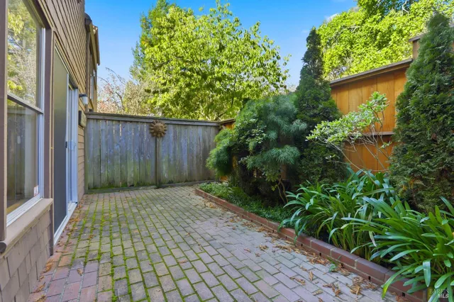 a backyard of a house with lots of green space
