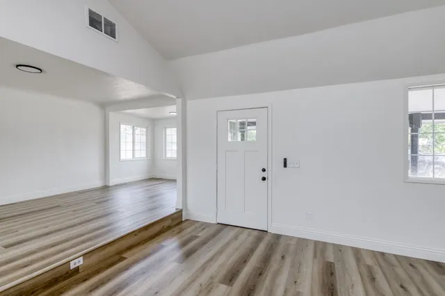 a view of an empty room and window