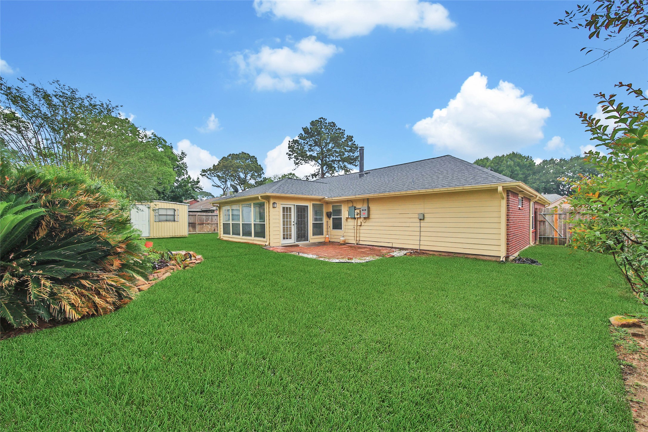5010 Cupids Bower Court Spring, TX 77388 - Photo 30 of 40 a view of a house with a backyard