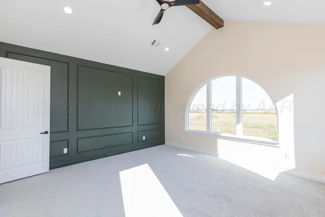 en empty room with closet and windows