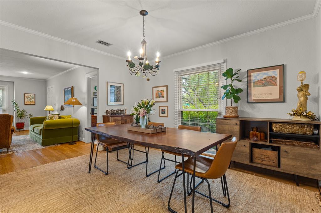 9461 Waterview Road Dallas, TX 75218 - Photo 11 of 40 a view of a dining room with furniture window and wooden floor