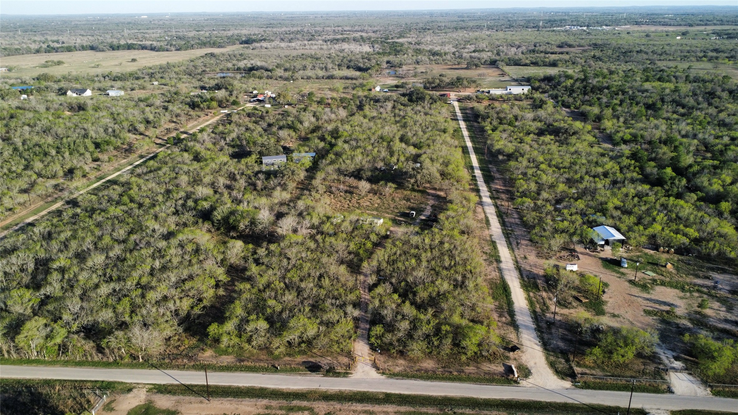 2209 Callihan Road Luling, TX 78648 - Photo 6 of 7 an aerial view of residential houses with outdoor space
