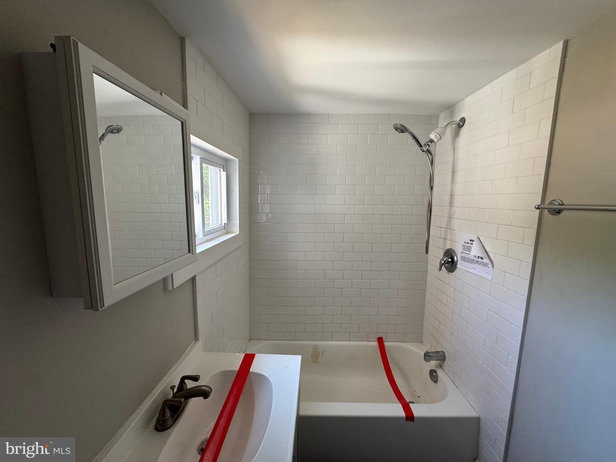 395 Tansboro Road Berlin, NJ 08009 - Photo 40 of 47 a bathroom with a tub and shower