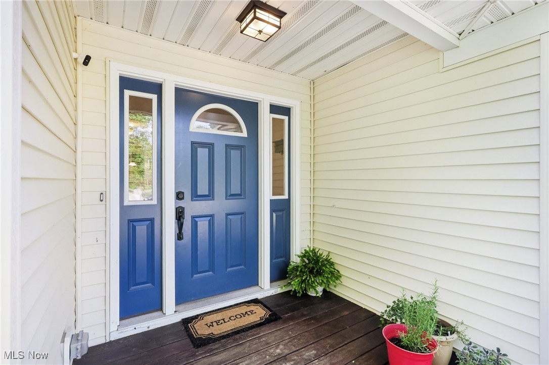 12881 Forest Road Burton, OH 44021 - Photo 10 of 48 View of front door entry into home