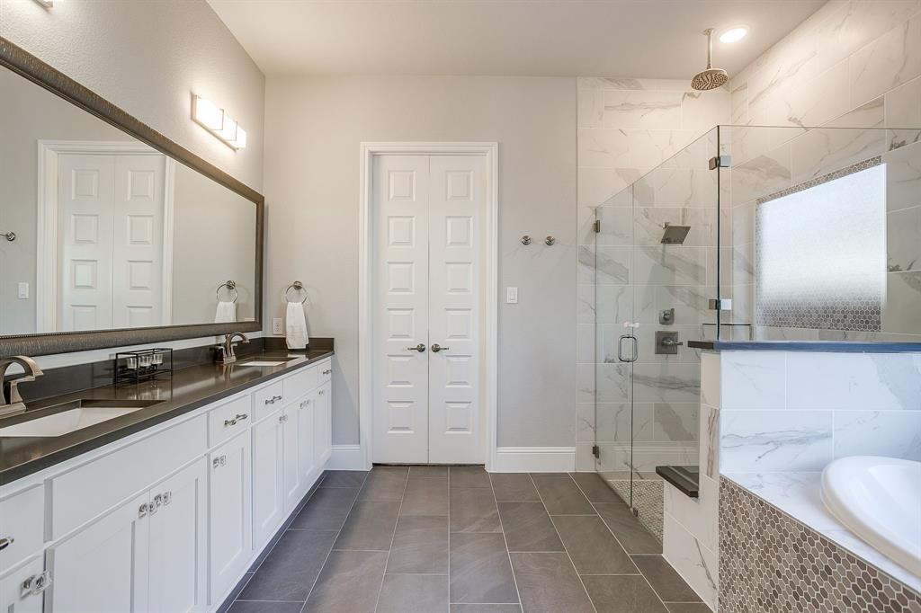 5637 Pope Creek Road Fort Worth, TX 76126 - Photo 17 of 40 Spacious primary bathroom with upgraded tile.