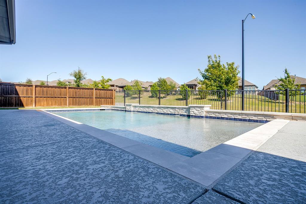 5637 Pope Creek Road Fort Worth, TX 76126 - Photo 35 of 40 Heated pool with water feature