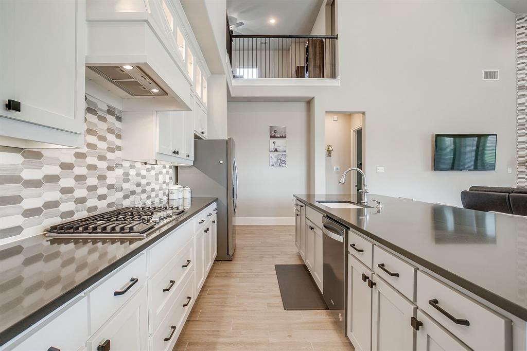 5637 Pope Creek Road Fort Worth, TX 76126 - Photo 9 of 40 Quartz countertops and a refrigerator that stays!