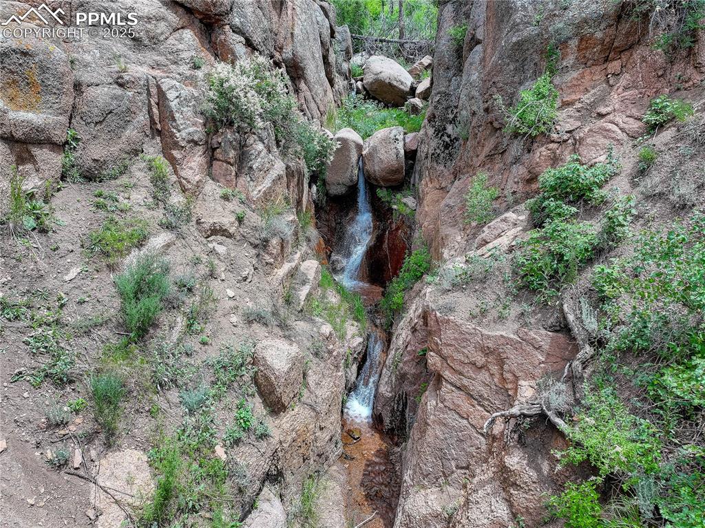 6085 Wellington Road Cascade, CO 80809 - Photo 12 of 13 a view of an outdoor space with a lake view