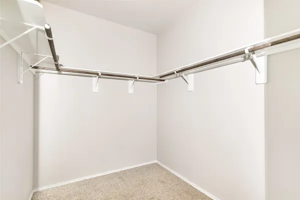 a view of small space with racks on the wall