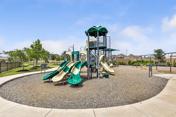 a view of a house with a street