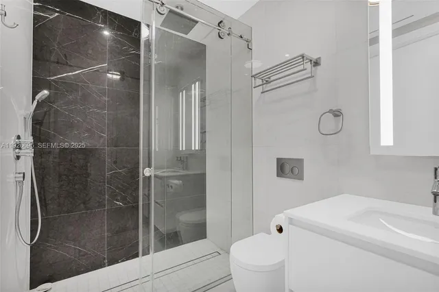 a view of balcony with outdoor seating and city view