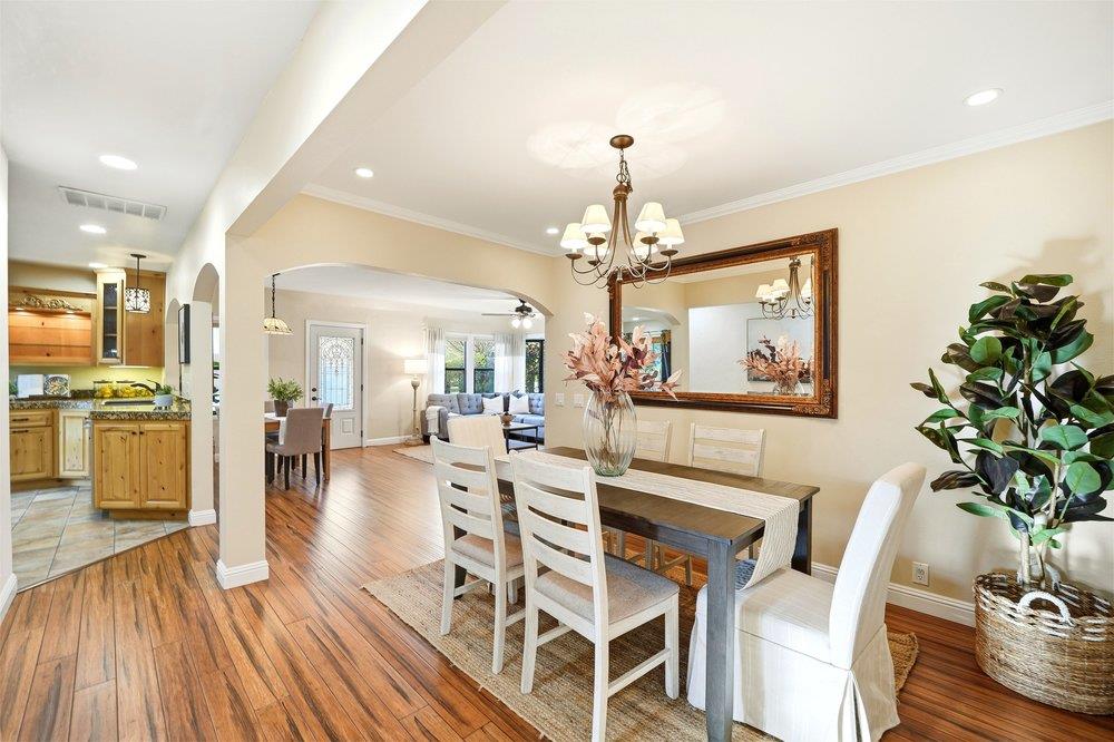 17235 Hill Road Morgan Hill, CA 95037 - Photo 11 of 44 a view of a dining room with furniture and wooden floor