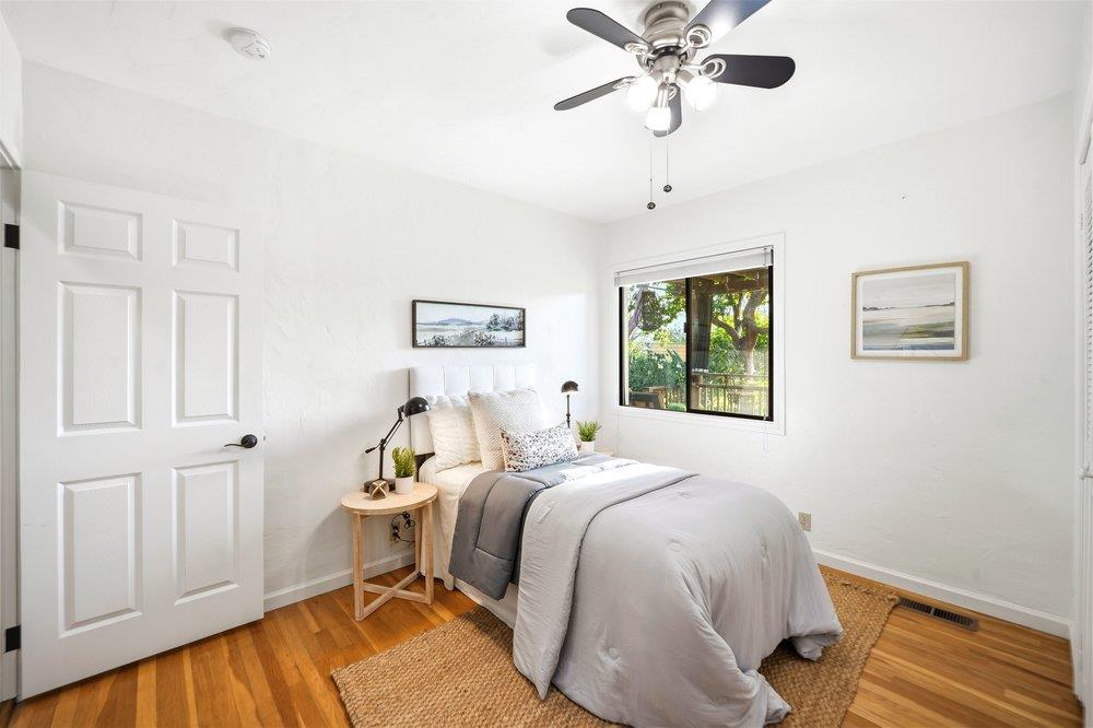 17235 Hill Road Morgan Hill, CA 95037 - Photo 13 of 44 a bedroom with a bed and a window