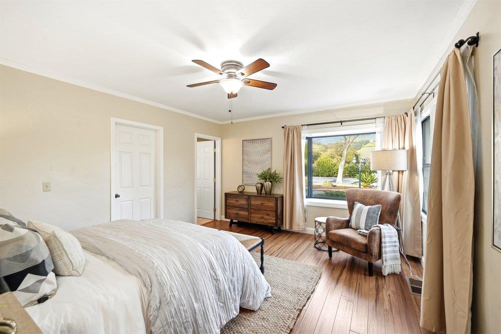 17235 Hill Road Morgan Hill, CA 95037 - Photo 17 of 44 a bedroom with furniture and a large window