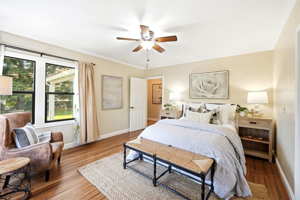 17235 Hill Road Morgan Hill, CA 95037 - Photo 18 of 44 a bedroom with a bed and wooden floor