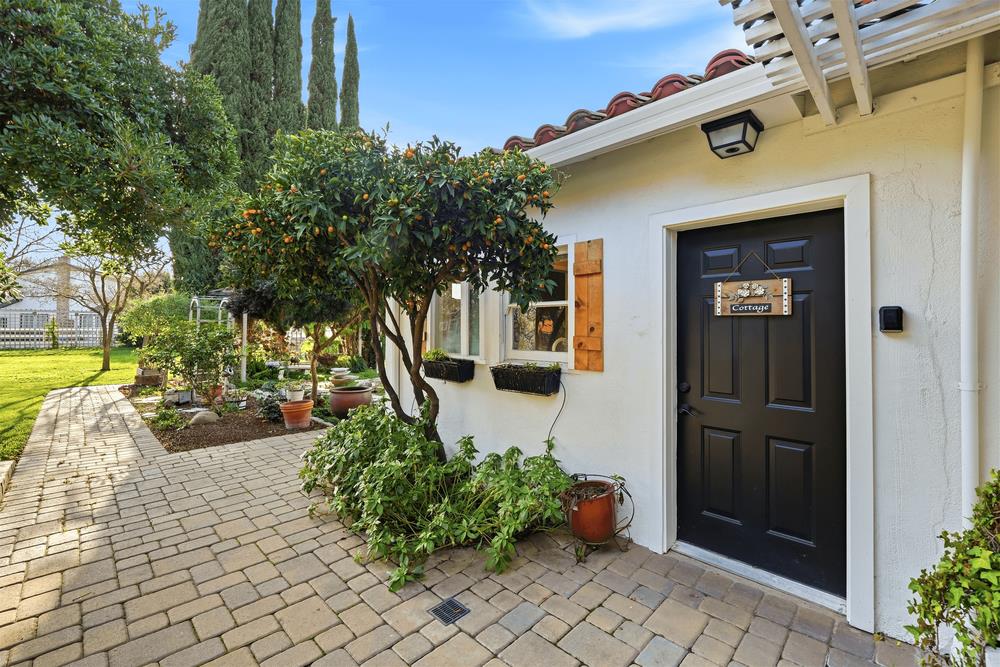 17235 Hill Road Morgan Hill, CA 95037 - Photo 24 of 44 a front view of a house with a yard