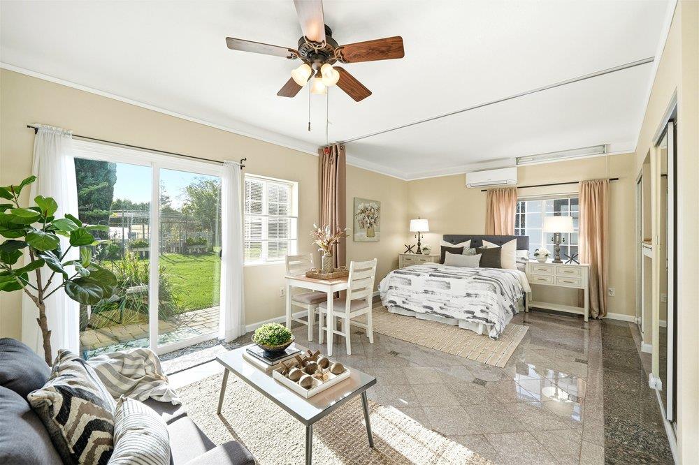 17235 Hill Road Morgan Hill, CA 95037 - Photo 27 of 44 a living room with furniture large window and a table