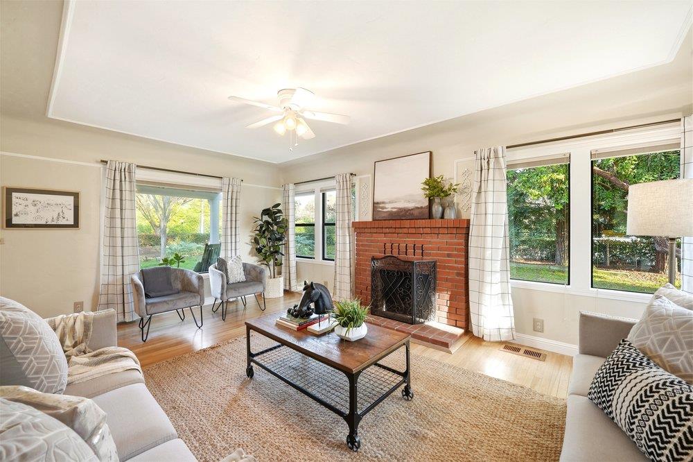 17235 Hill Road Morgan Hill, CA 95037 - Photo 3 of 44 a living room with furniture and a fireplace