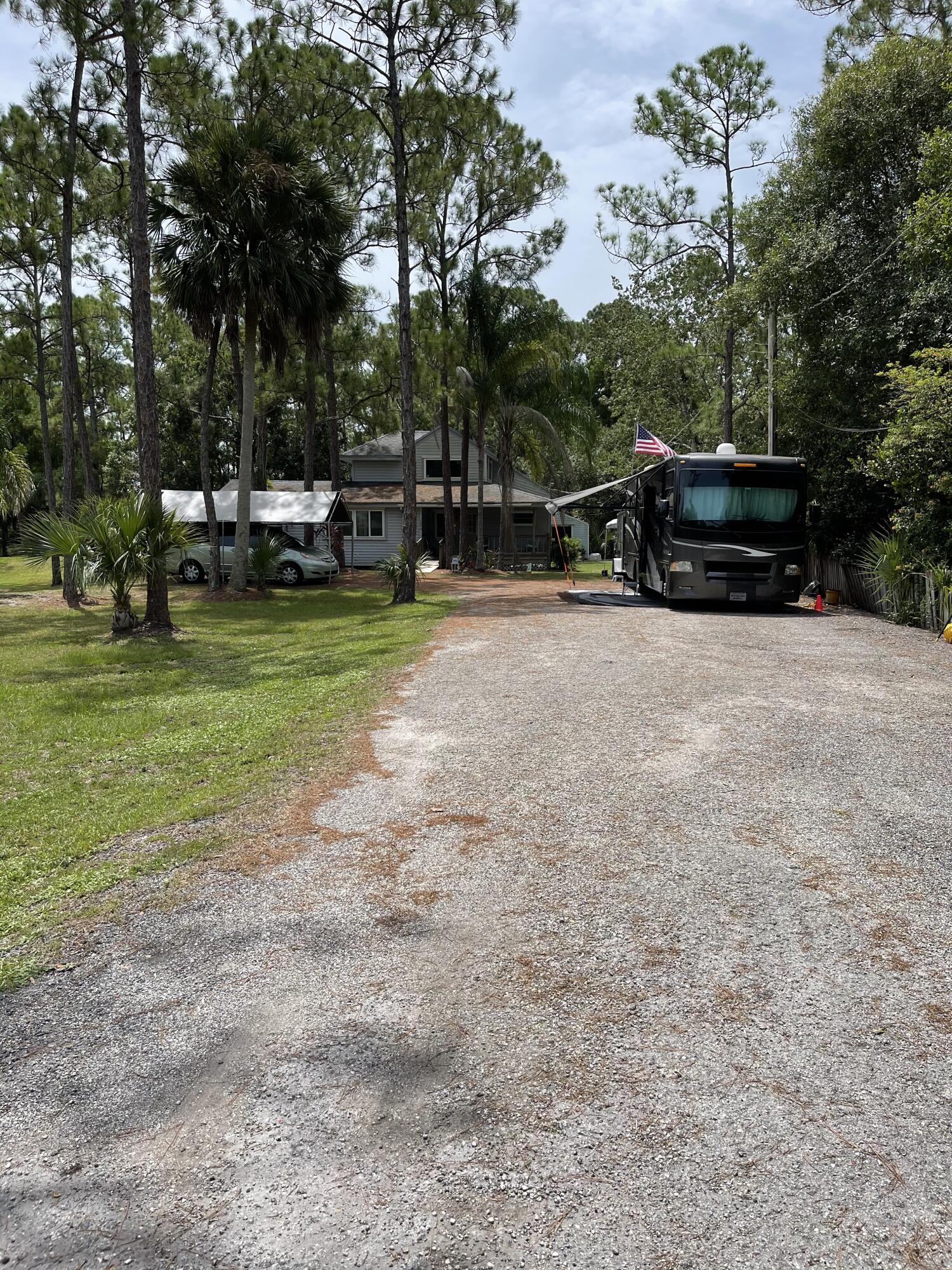 10874 154th Road North Jupiter, FL 33478 - Photo 4 of 21 Front Yard/ RV Hookup