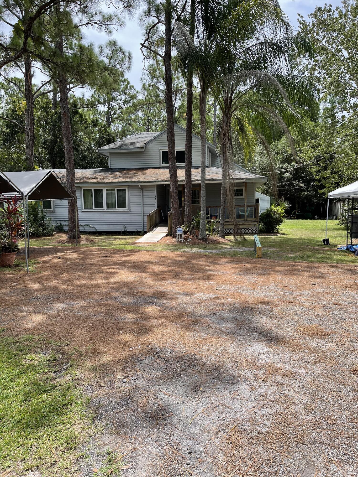 10874 154th Road North Jupiter, FL 33478 - Photo 6 of 21 Front Exterior