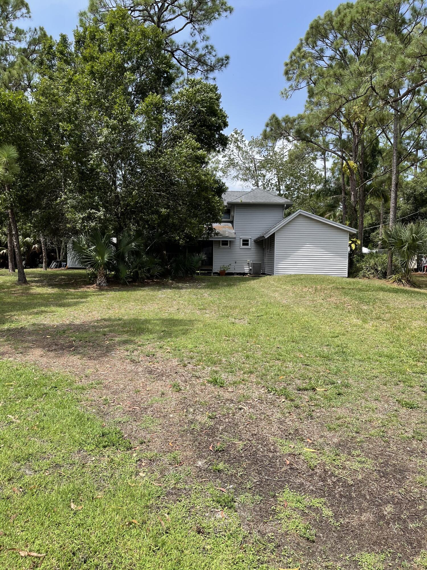 10874 154th Road North Jupiter, FL 33478 - Photo 9 of 21 Side Exterior