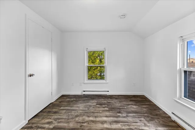 a view of a room that has a window in it