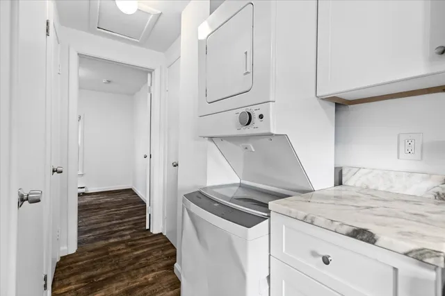 a view of a kitchen from the hallway