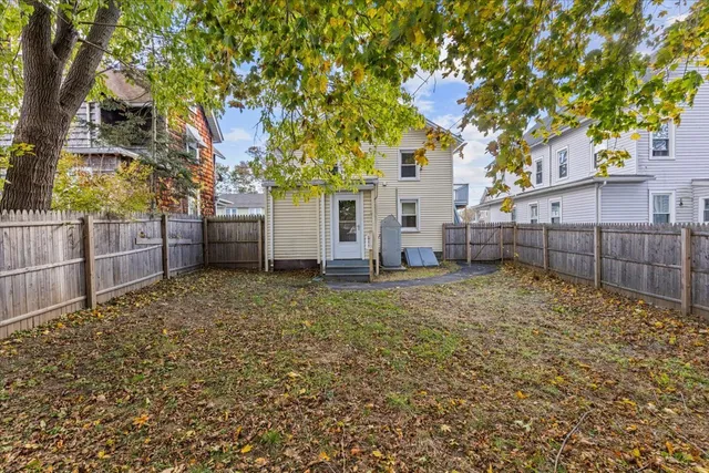 a view of a backyard of the house