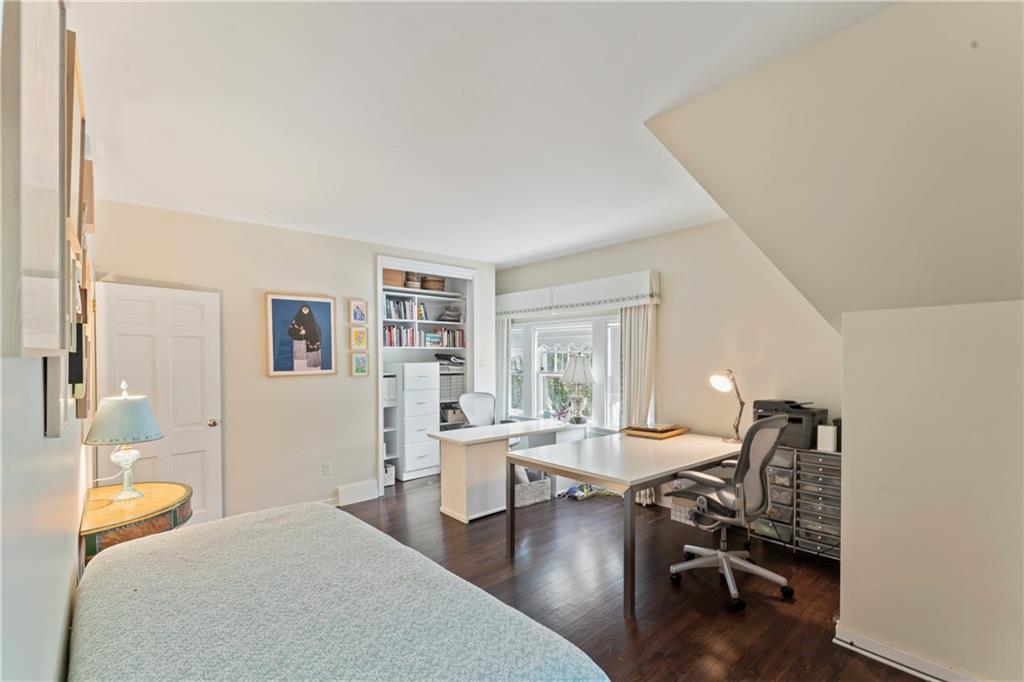 1521 Wightman Street Pittsburgh, PA 15217 - Photo 24 of 40 a bedroom with furniture and a wooden floor