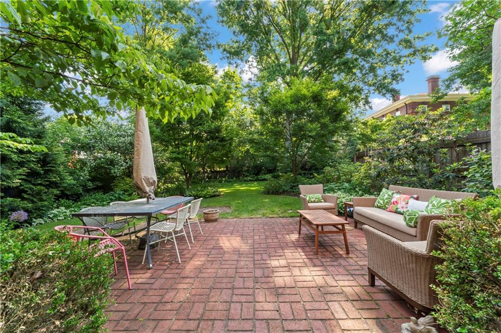 1521 Wightman Street Pittsburgh, PA 15217 - Photo 34 of 40 a view of a patio with table and chairs potted plants with large tree