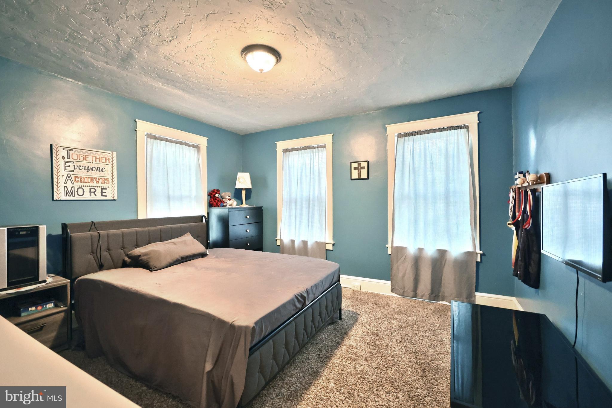 14 Gateway Road York, PA 17403 - Photo 17 of 35 a bedroom with a bed and wooden floor