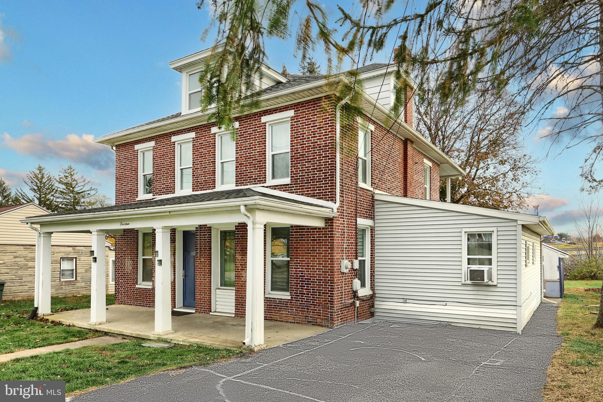 14 Gateway Road York, PA 17403 - Photo 2 of 35 a view of a house with a window and wooden fence