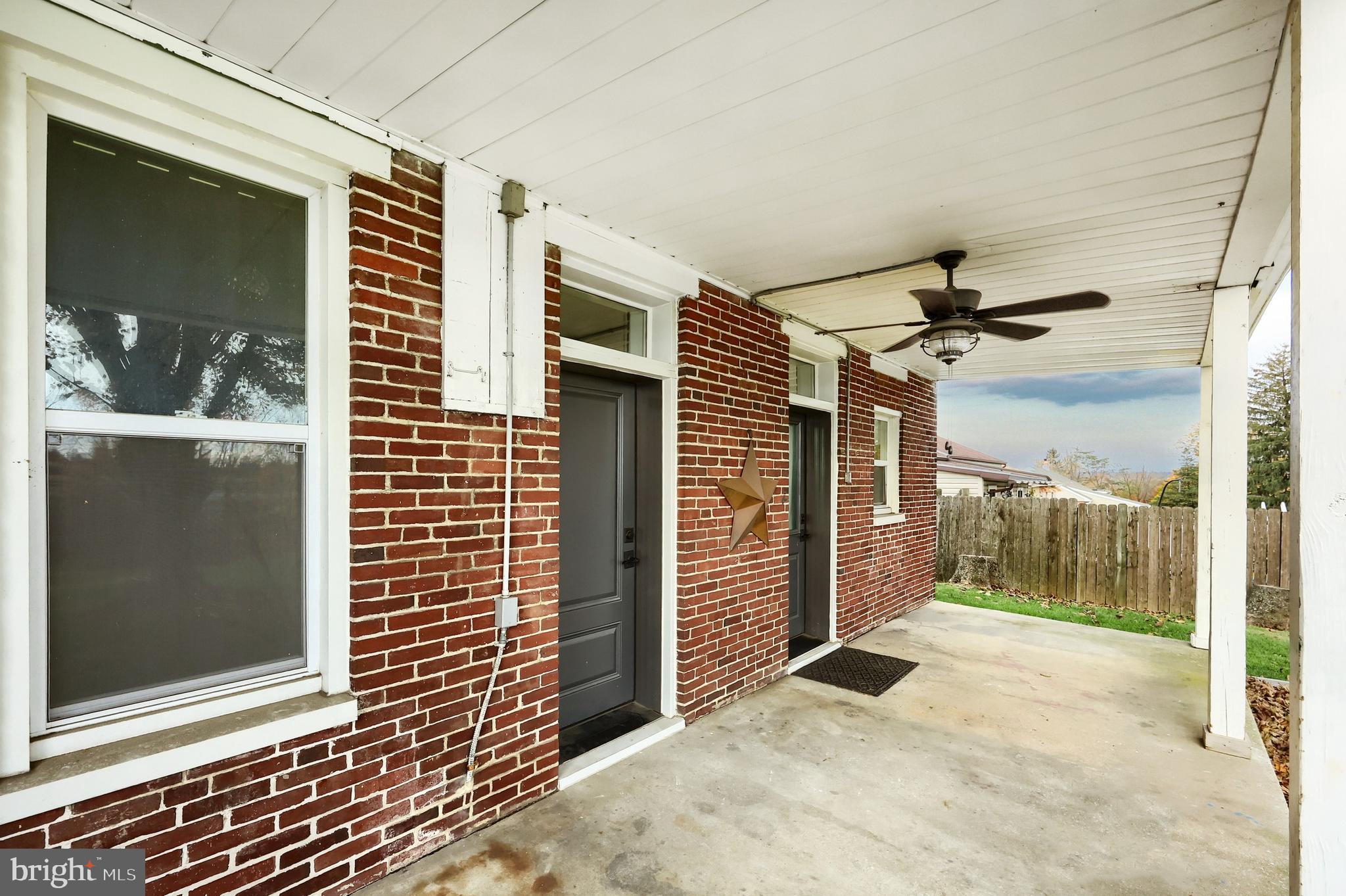 14 Gateway Road York, PA 17403 - Photo 26 of 35 a view of a porch with a door and wooden floor