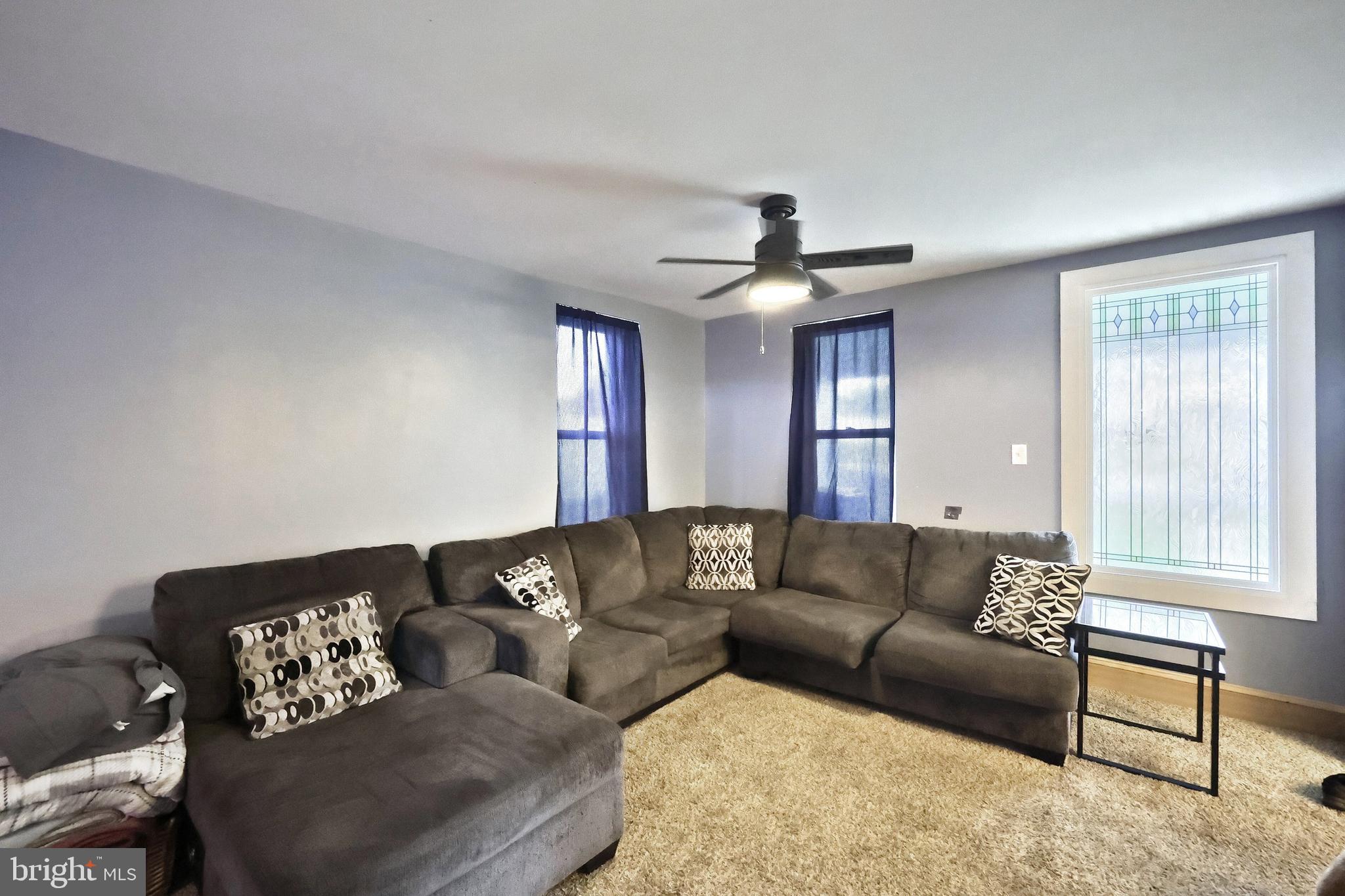 14 Gateway Road York, PA 17403 - Photo 7 of 35 a living room with furniture and a window