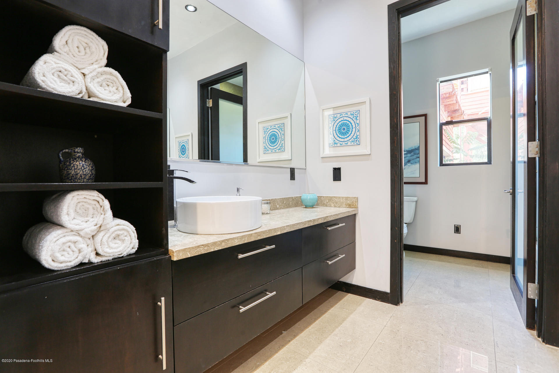 2315 Holgate Square Los Angeles, CA 90031 - Photo 37 of 56 a bathroom with a sink and a mirror