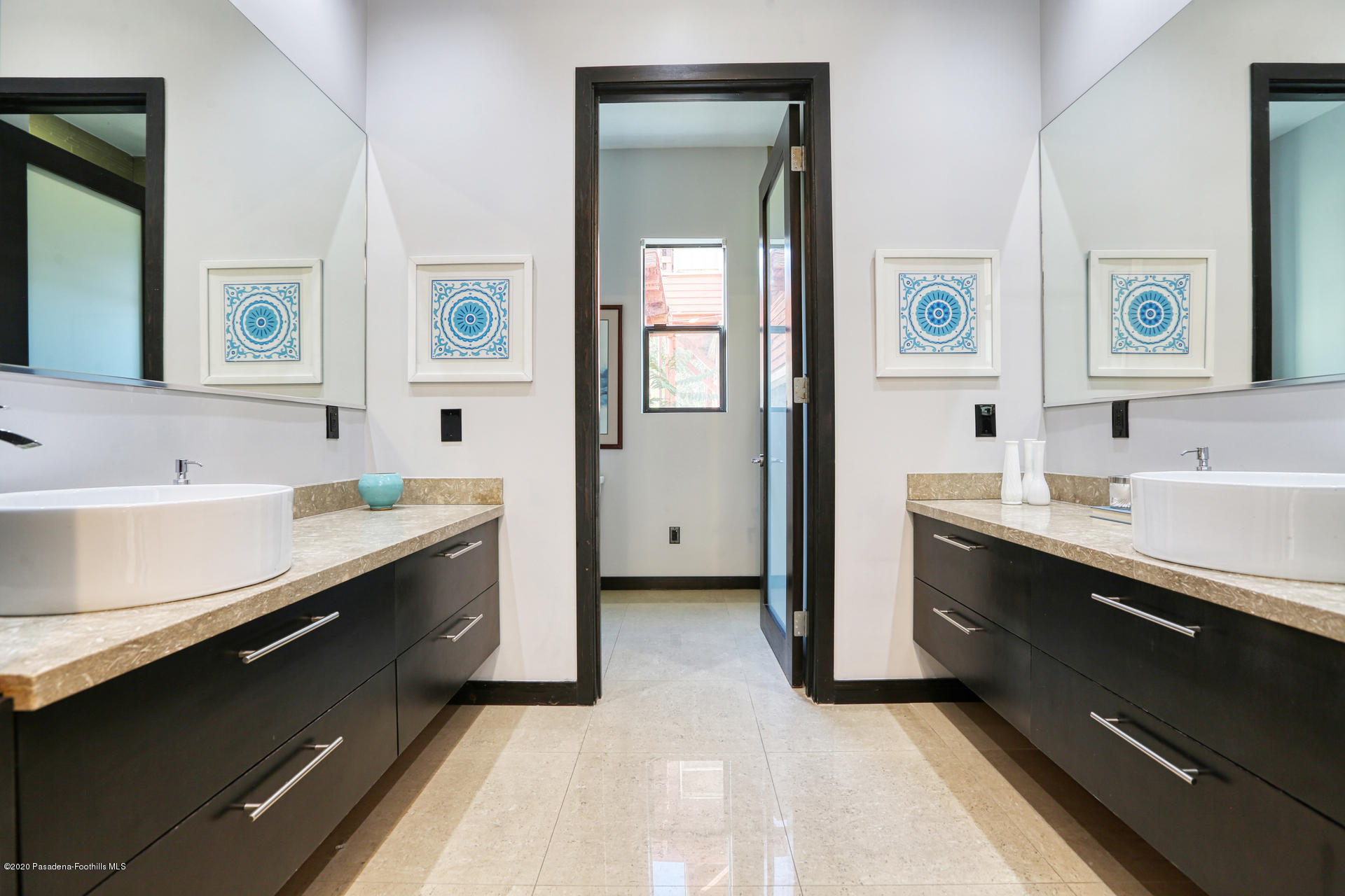 2315 Holgate Square Los Angeles, CA 90031 - Photo 38 of 56 a en suite bathroom with a double vanity sink a and mirror